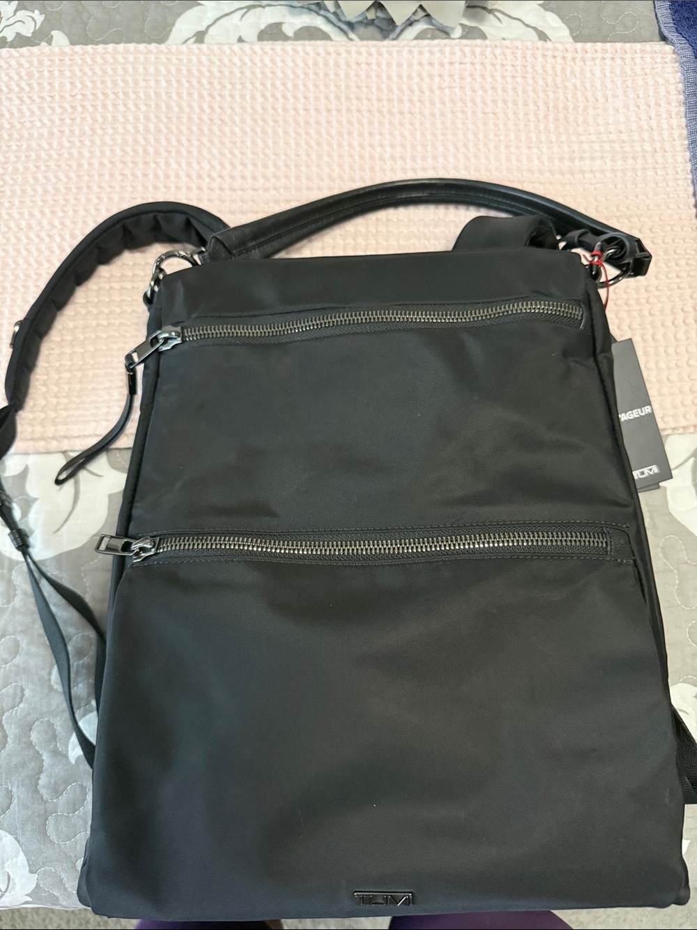 Tumi Black “Leigh” Nylon Convertible Sling Backpack